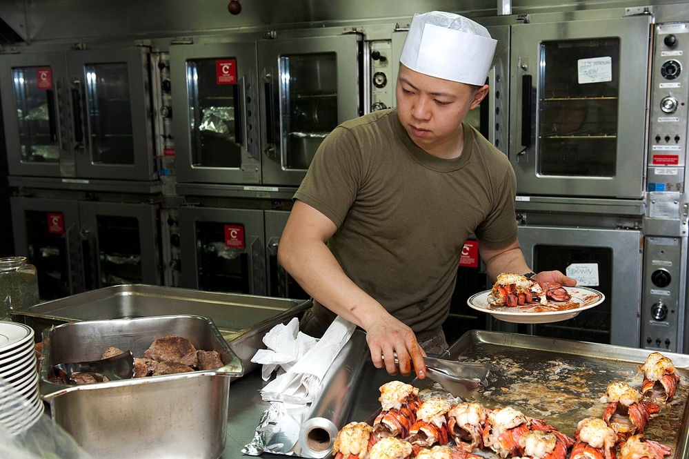 Marine prepares birthday meal aboard USS Pearl Harbor