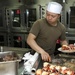 Marine prepares birthday meal aboard USS Pearl Harbor