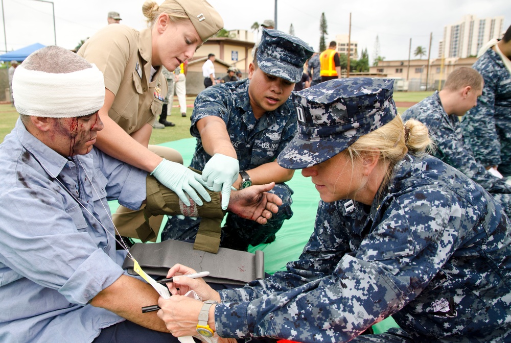 Sailors treat simulated wounds during exercise