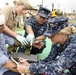 Sailors treat simulated wounds during exercise