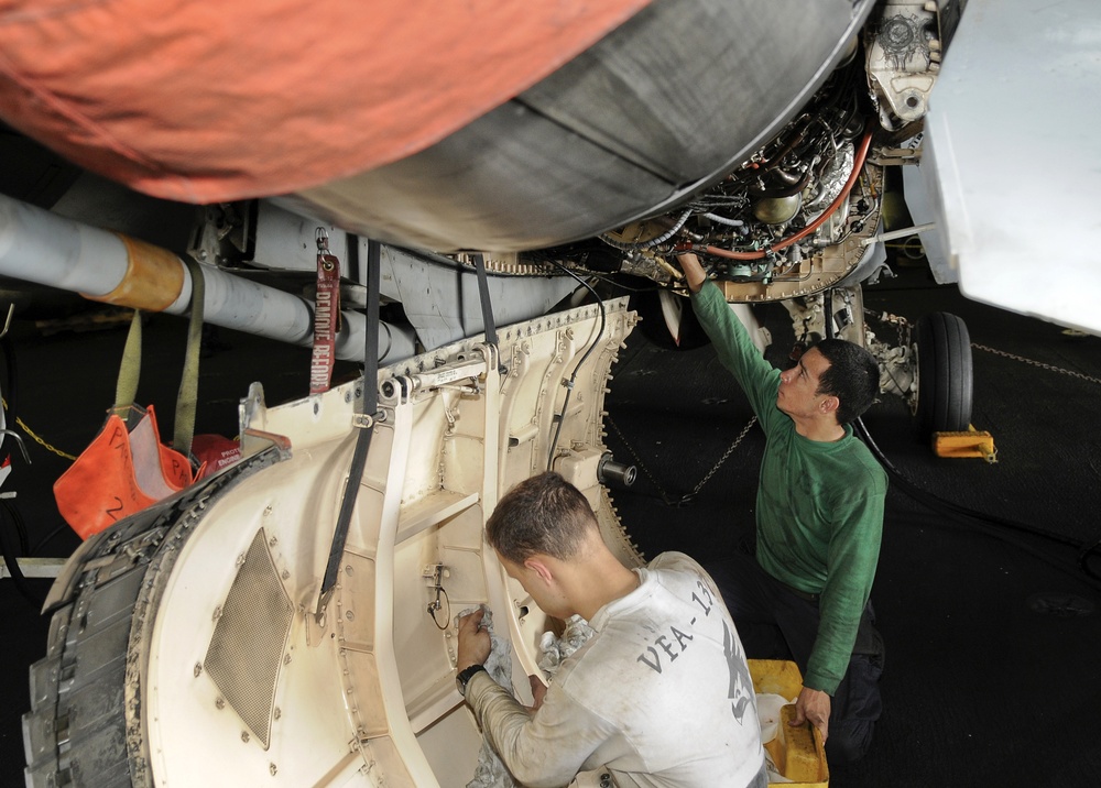 USS Abraham Lincoln sailors prep engine