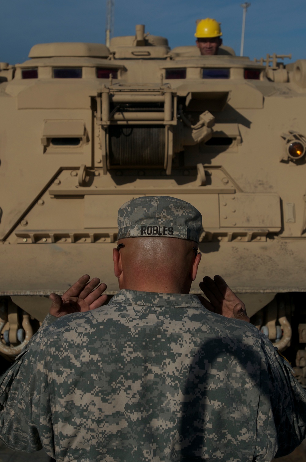 Marines and soldiers load heavy equipment during African Lion 2012