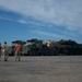 Marines and soldiers load heavy equipment during African Lion 2012