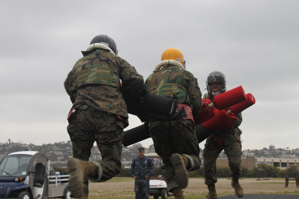 Pugil sticks provide Company E recruits close-combat training