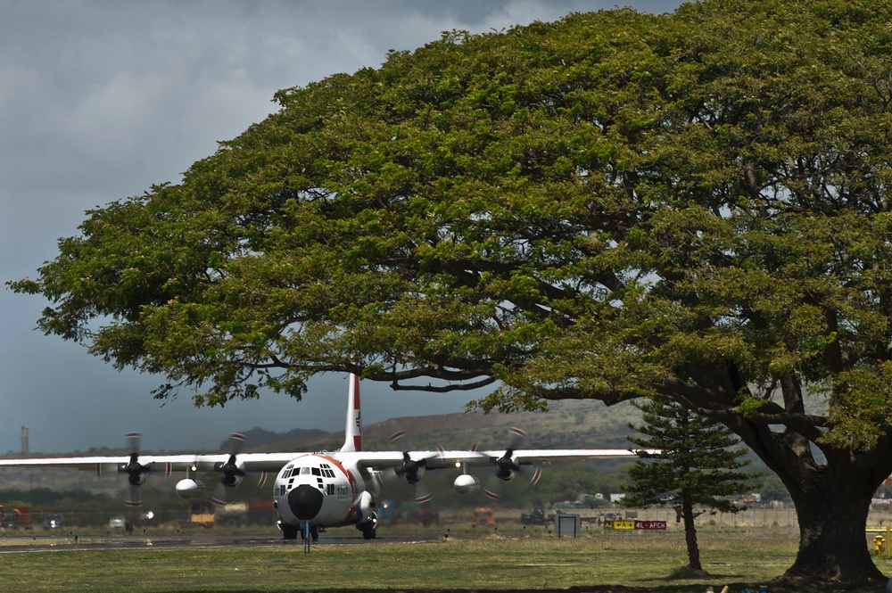 USCG HC-130 Hercules performs search and rescue training mission off the coast of Oahu
