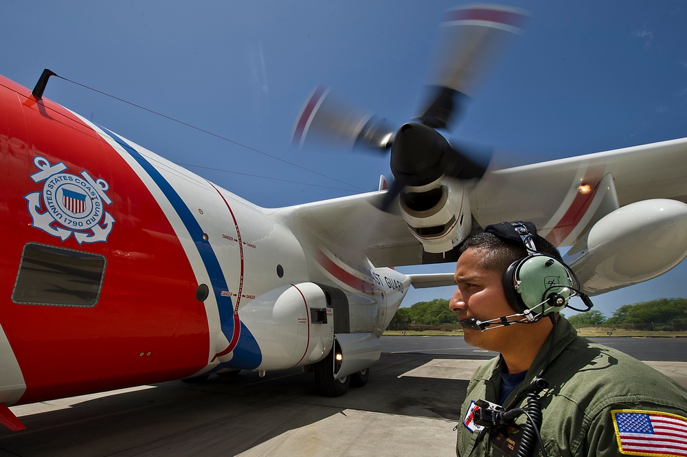 USCG HC-130 Hercules performs search and rescue training mission off the coast of Oahu