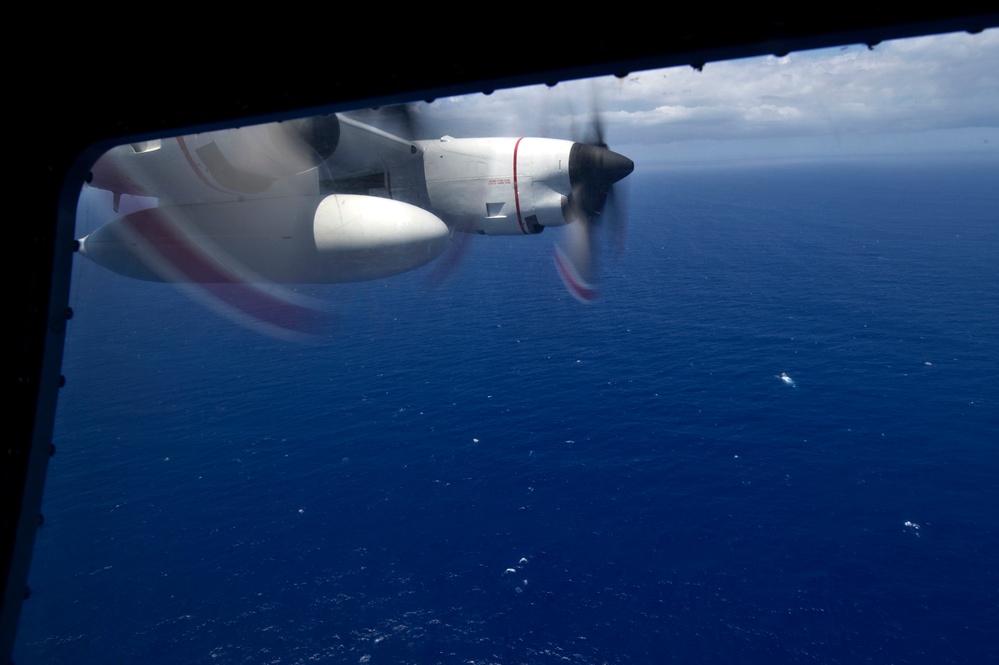 USCG HC-130 Hercules performs search and rescue training mission off the coast of Oahu
