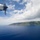 USCG HC-130 Hercules performs search and rescue training mission off the coast of Oahu USCG HC-130 Hercules performs search and rescue training mission off the coast of Oahu
