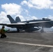 Aircraft depart and land aboard USS John C. Stennis