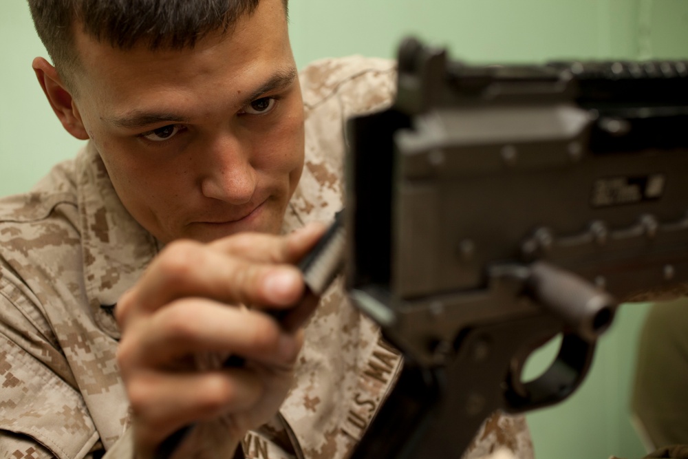 Marine maintains weapon aboard USS Makin Island