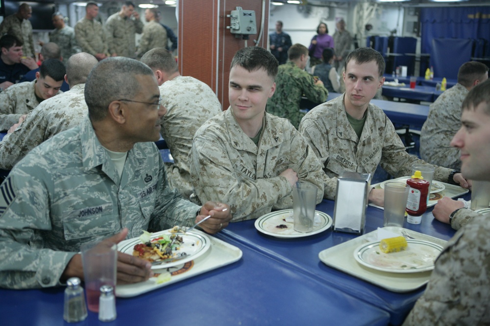 AFRICOM commanding general and senior enlisted leader chat with sailors and Marines aboard the Iwo Jima during African Lion 2012