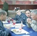 Commanding general and senior enlisted leader from 4th Marine Air Wing chat with Marines and sailors aboard the Iwo Jima during African Lion 2012