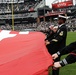 Navy sailors unfurl flag at White Sox opener