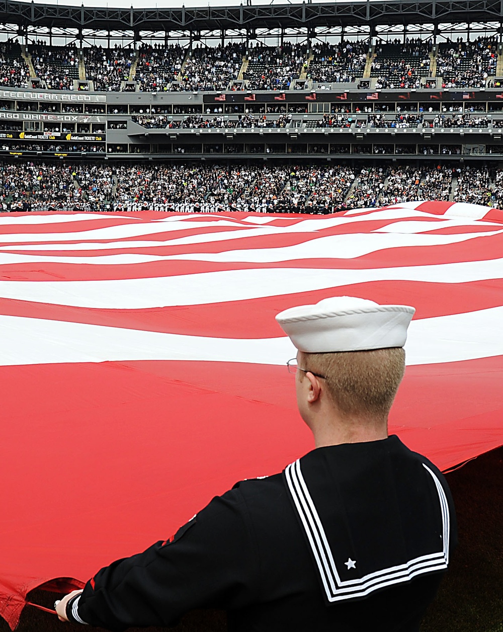 Navy sailors unfurl flag at White Sox opener