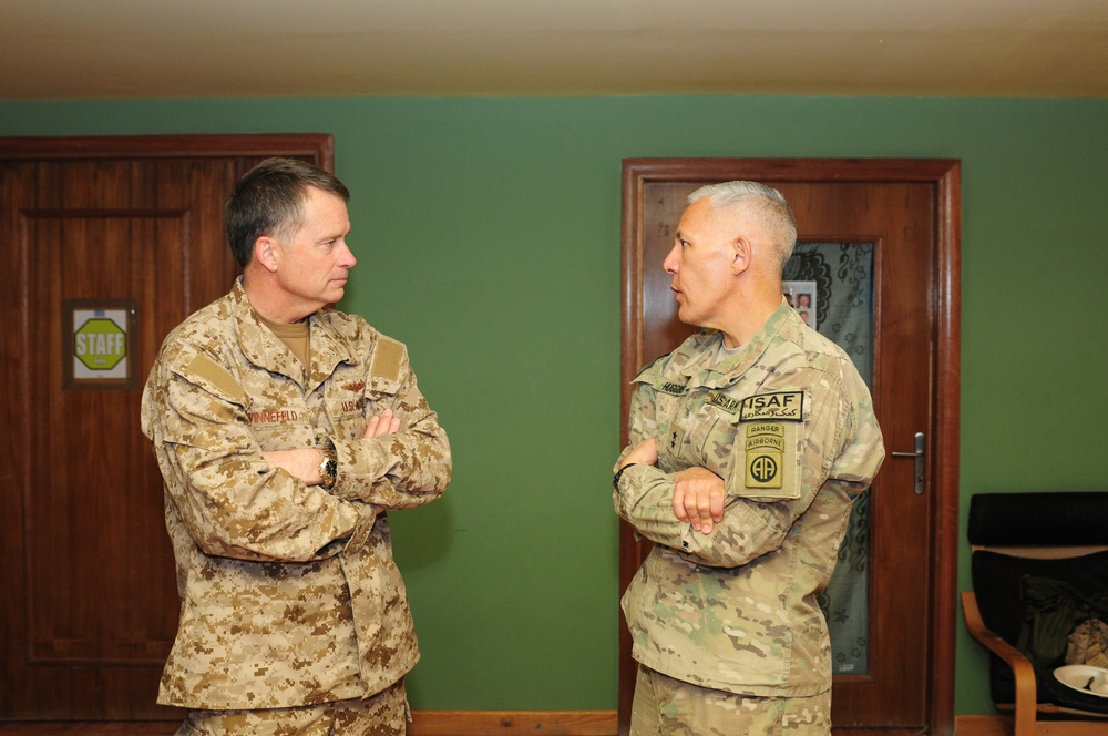 Adm. Winnefeld speaks with Maj. Gen. Huggins