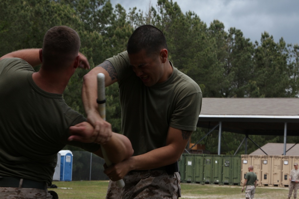 APS-12: Ground Combat Element pushes through pain of OC during Non-Lethal Weapons &amp; Tactics training