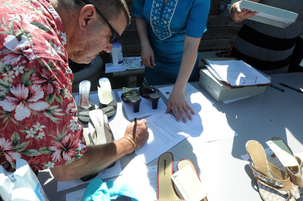 Idaho Guardsmen walk in her shoes for a cause