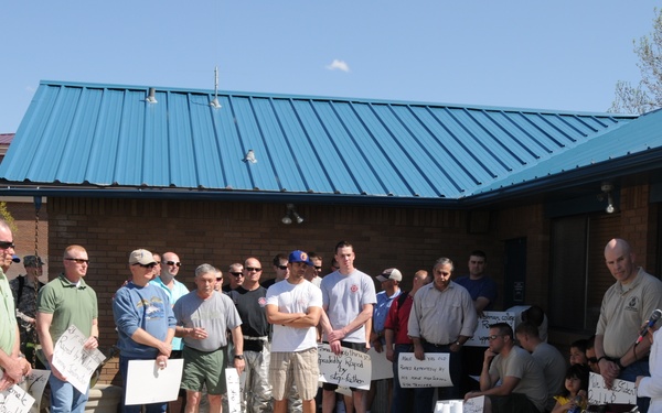 Idaho Guardsmen walk  in her shoes for a cause
