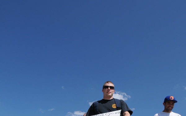 Idaho Guardsmen walk in her shoes for a cause