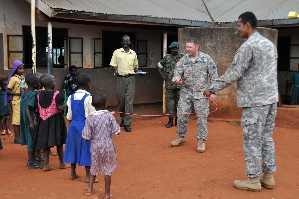 Texas National Guardsmen share best practices with Ugandan airmen, children
