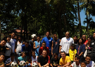Filipino futbol team, US service members ‘kick it’ during youth clinic