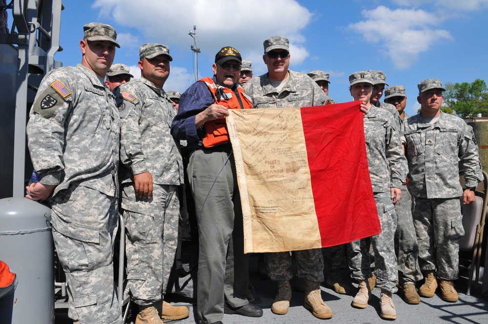 Holding a pilot flag from Vietnam