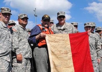 Holding a pilot flag from Vietnam