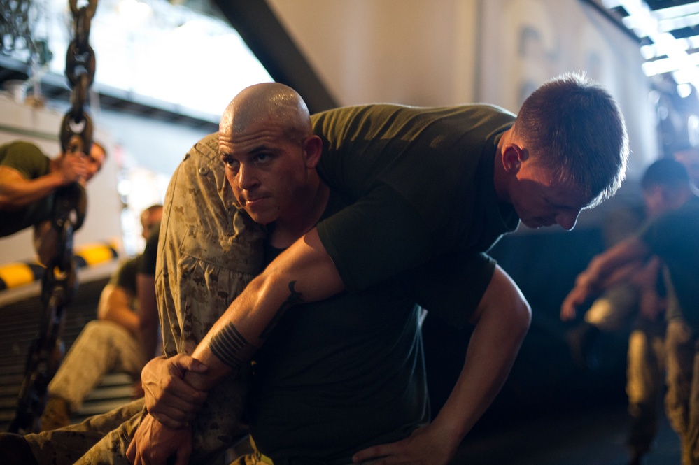 Marines grapple aboard USS Pearl Harbor