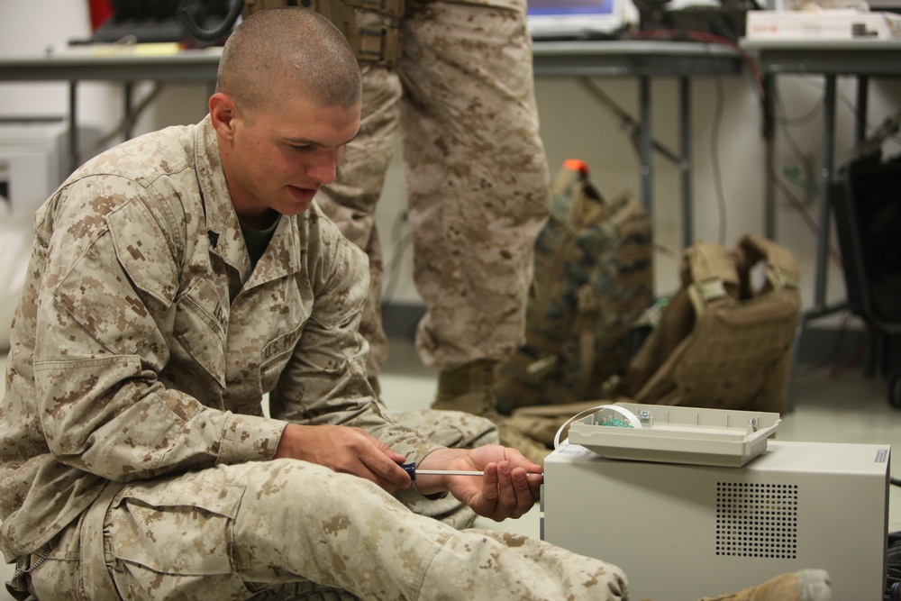 Communication technician Marines provide repairs to operations in Afghanistan
