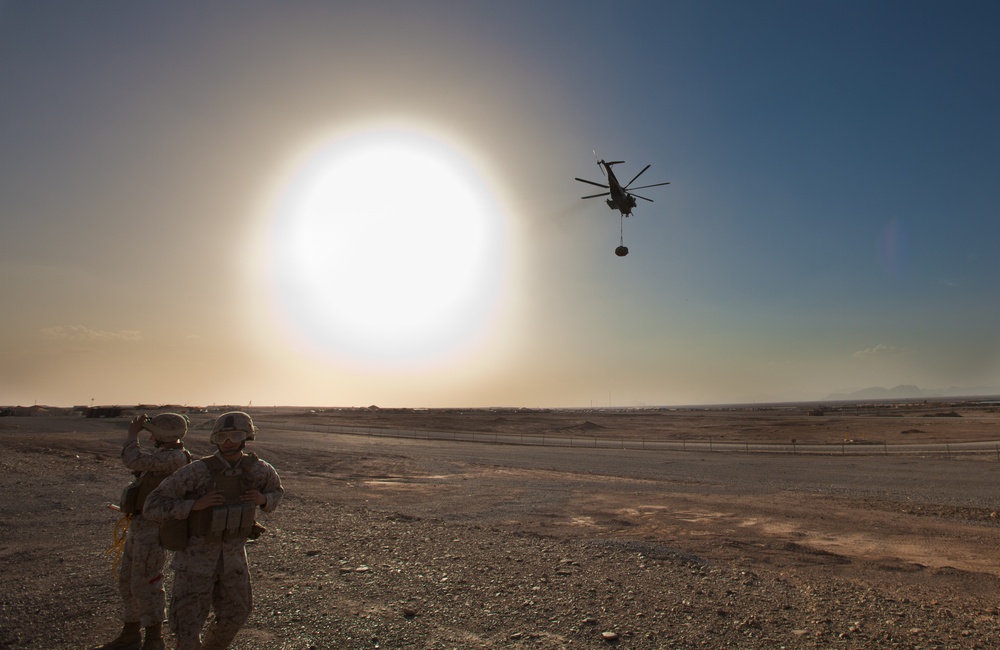 Logistics Marines assist infantry with resupply by air