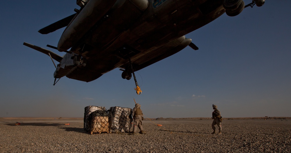 Logistics Marines assist infantry with resupply by air
