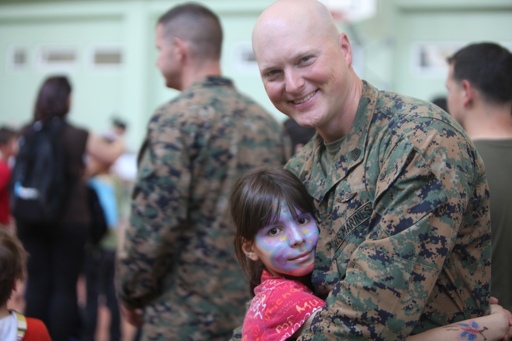 Marines show orphaned children another side of the Corps