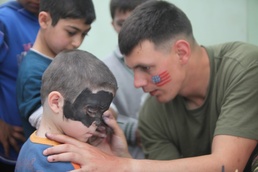 Marines show orphaned children another side of the Corps