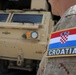 Croatian soldiers maintain the vehicle fleet