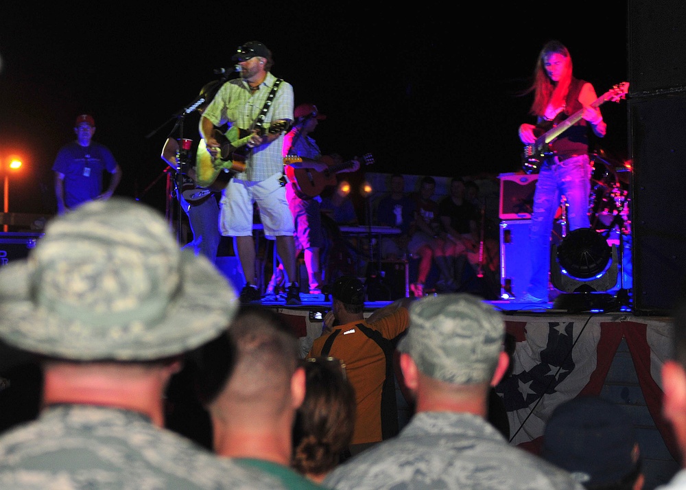 Award-winning country music superstar Toby Keith sing “Who’s Your Daddy” to the 2500 Army, Navy, Air Force, Marines, French military, Japanese military, and civilian employees watching the concert at Camp Lemonnier