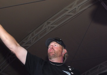 Playing to the base: Toby Keith sings at Camp Buehring during his 'Live In Overdrive' USO tour