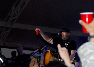 Playing to the base: Toby Keith sings at Camp Buehring during his 'Live In Overdrive' USO tour