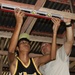 Filipino volunteers learn new trade to build up community