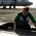 USS Dwight D. Eisenhower sailor cleans