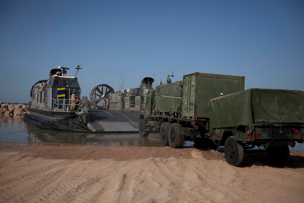 Loading an 11th MEU vehicle