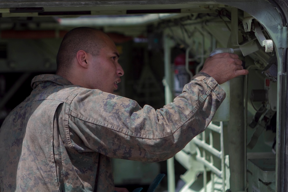 Marines wash equipment