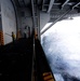USS Carl Vinson sailor performs corrosion control