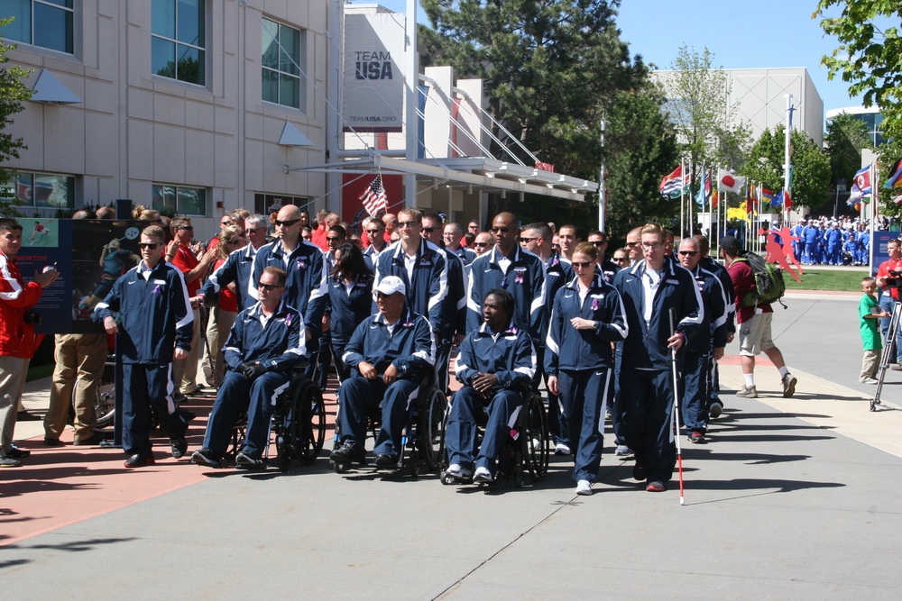 Team Navy/Coast Guard proceeds towards the 2012 Warrior Games opening ceremony