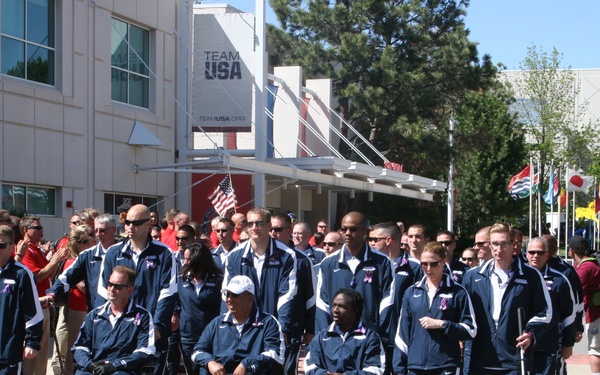 Team Navy/Coast Guard proceeds towards the 2012 Warrior Games opening ceremony