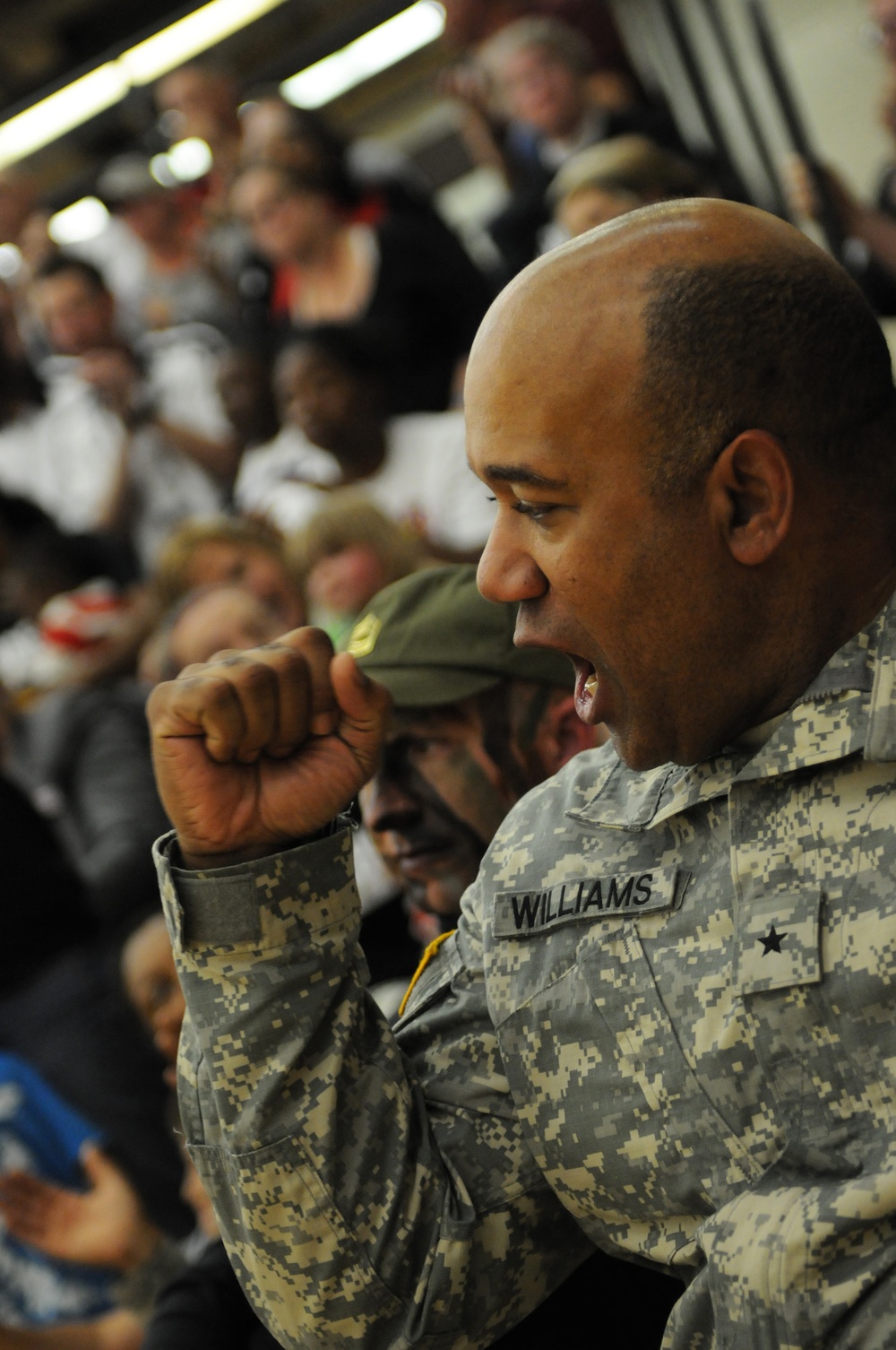 Gen. Darryl Williams cheers on the Army sitting volleyball team at the Warrior Games 2012