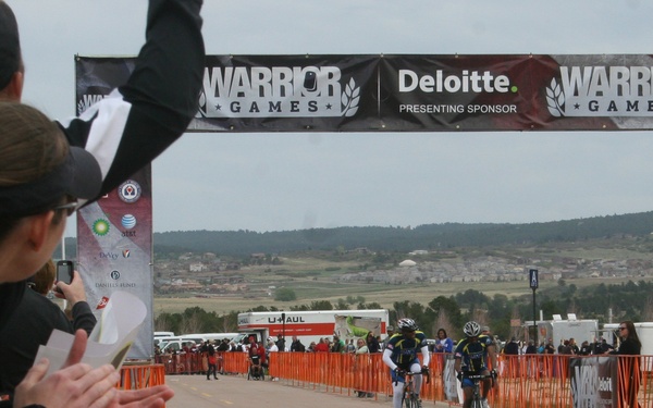 Team Navy/Coast Guard cyclists push through to the finish