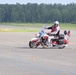 Ride circles the cones at a motorcycle training course