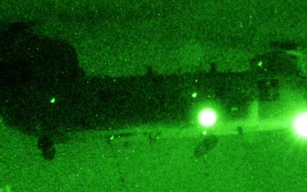 Chinook helicopter prepares to transport tower after slingload operation