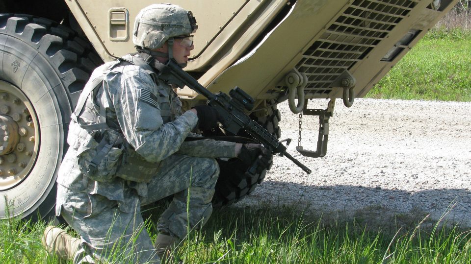 Paratrooper pulls security during convoy live fire