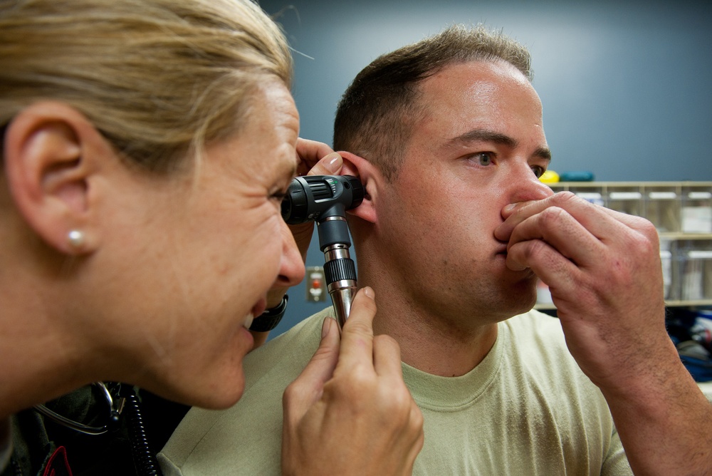 Airmen perform flight medicine exams